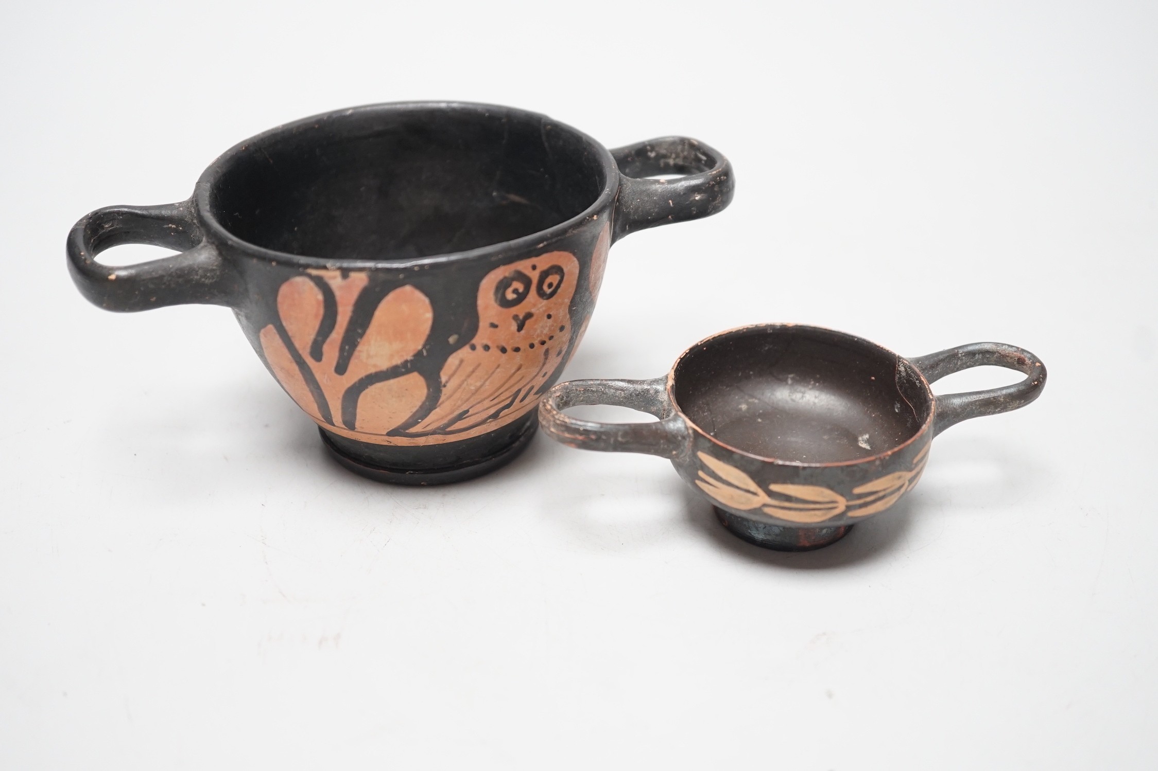 A 4th century B.C. South Italian Greek red figure bowl skyphos, together with another similar smaller vessel. Larger 14.5cm handle to handle